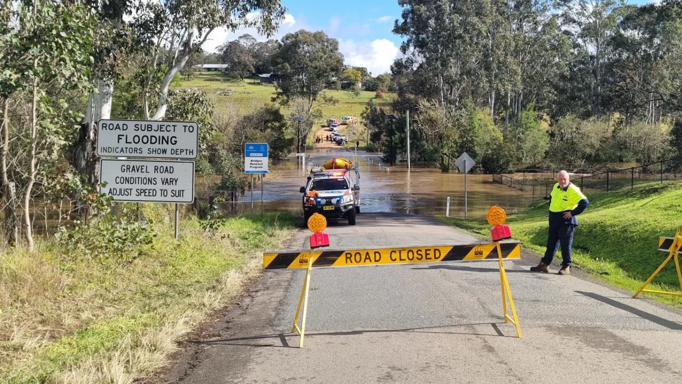 SES crews at closed road at Wollombi NSW assisting with patient transport