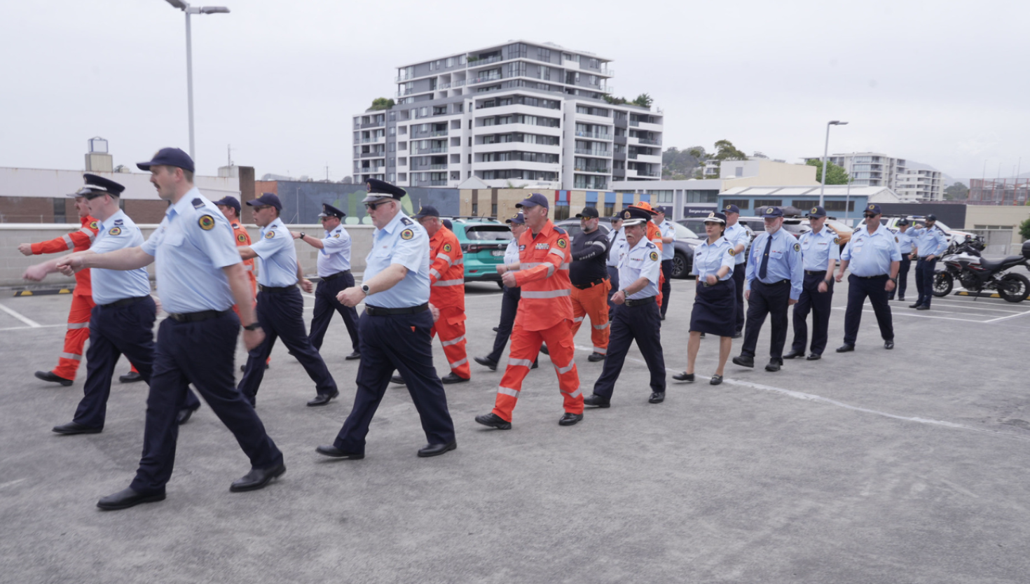 NSW SES members in line marching outside
