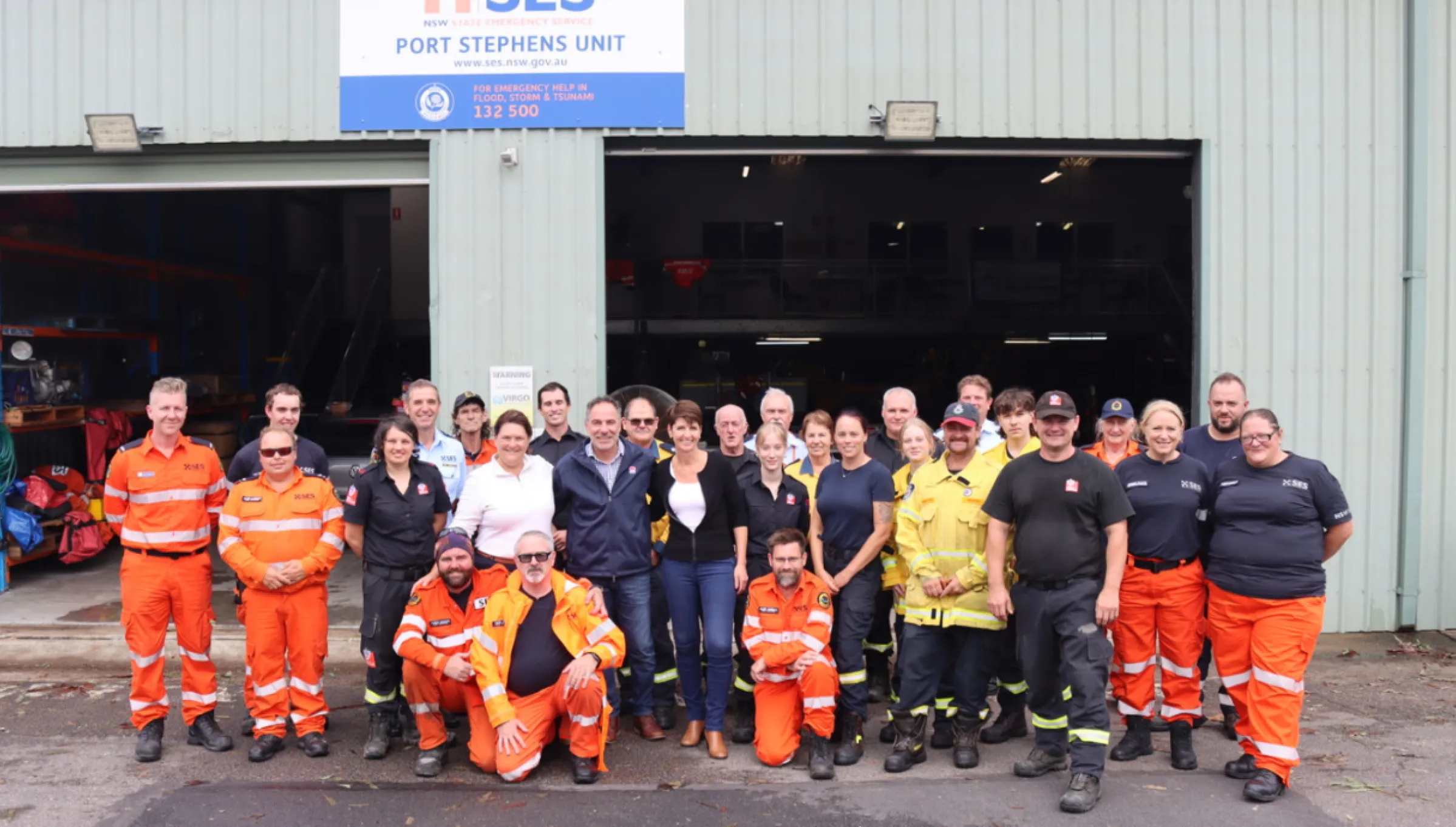 Member group photo in front on Port Stephens Unit