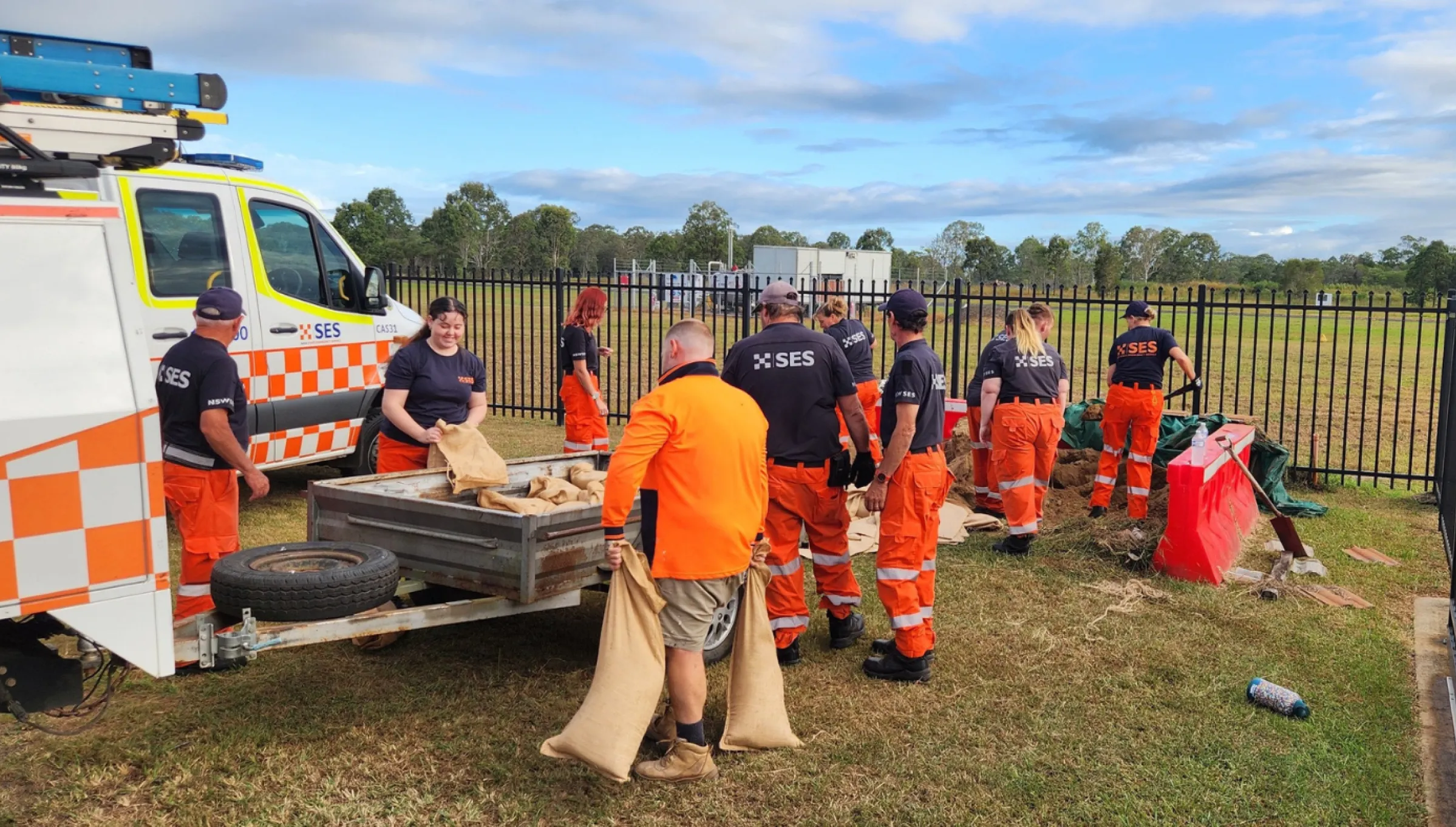 SES volunteers packing sandbags ahead of Cyclone Alfred